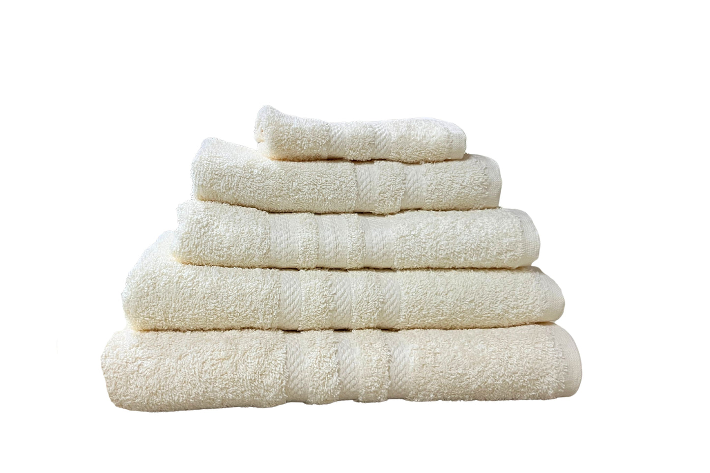 Juego de toallas Combo Klassik Ivory color marfil, cinco unidades en cama elegante
