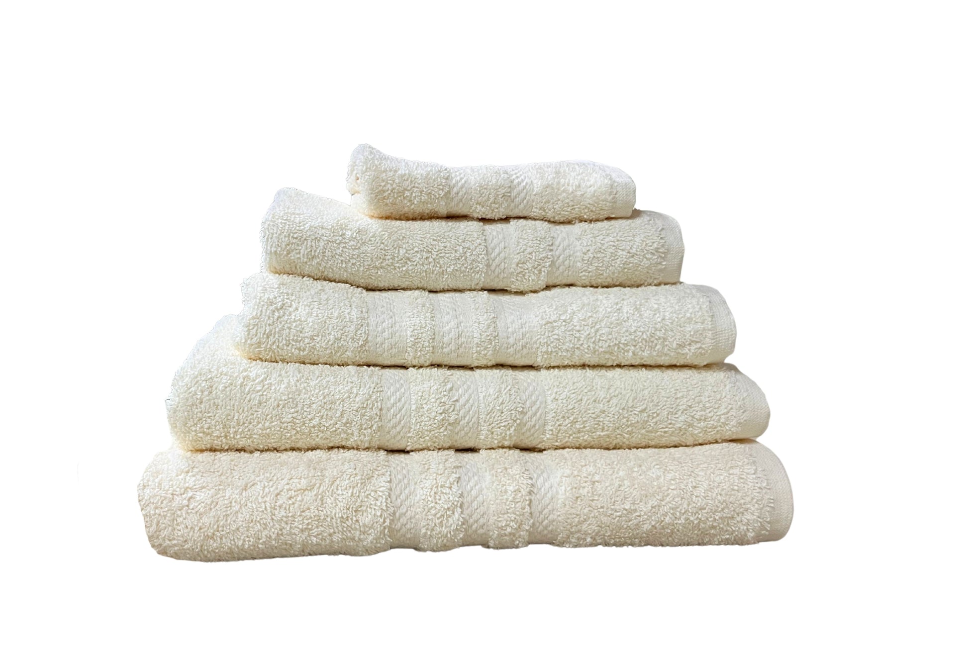 Juego de toallas Combo Klassik Ivory color marfil, cinco unidades en cama elegante